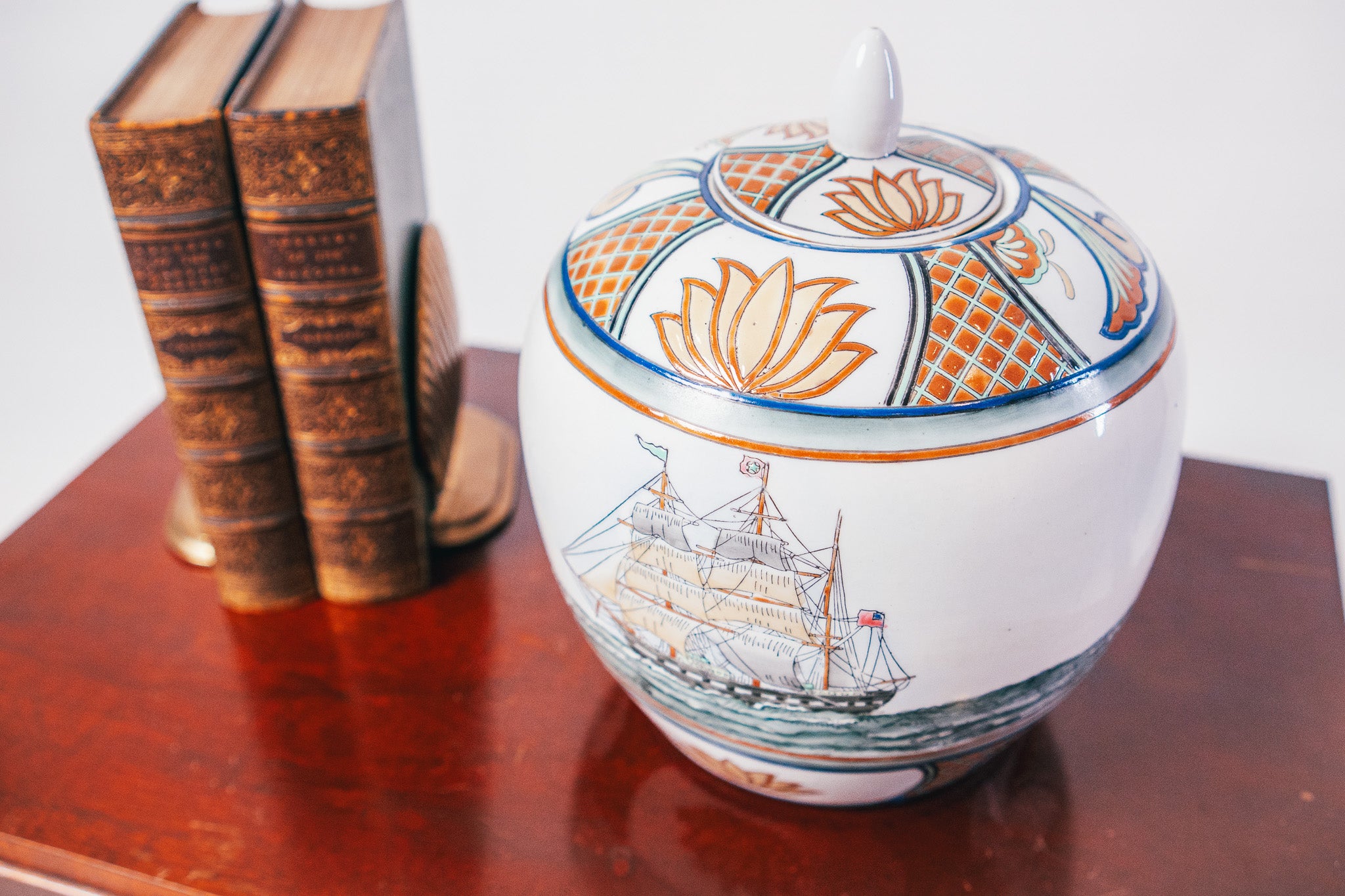 Decorative Lidded Porcelain Jar Featuring A Nautical "Black Ship"